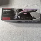 Brookstone Motorized Grill Brush With Steam Cleaning Power New Instructions. Fixed Price $24.99.