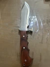 Maxam Stainless Steel Bowie Knife Over 5IN Wood Handle Full Tang Clip Point. Fixed Price $29.99.