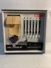 New Oggi 9 Piece Oyster Knife Forks Wooden Block Stainless Steel. Fixed Price $25.00.