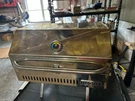Magma Catalina Classic Marine Gas Grill, W/cover. Shelf. Cutting Board. Fixed Price $250.00.