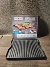 Camp Chef 14" X 16" Reversible Pre-seasoned Cast Iron Griddle, Cooking Surface. Fixed Price $47.59.