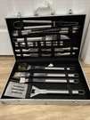 Sharper Image 25 Piece Stainless Steel Grill Set Outdoor Camping Picnic Tool. Fixed Price $95.95.