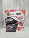 Grillbot Automatic Cleaning Robot With Case & Nylon Brushes. Fixed Price $49.99.