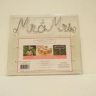 Mr. & Mrs. Silver Wire Cake Pick Topper New Unopened Package. Fixed Price $8.01.