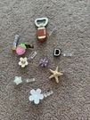 Lot Of 8 New Crocs Jibbitz, Bottle Opener Light Up. Fixed Price $12.00.