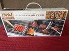 Parini Stainless Steel Hot Dog Roller Salt & Pepper Shaker - Brand New. Fixed Price $29.99.
