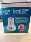 Big Green Egg Sittin Turkey Roaster #301017. Fixed Price $19.00.