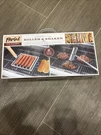 Parini Stainless Steel Hot Dog Roller And Salt & Pepper Shaker - New Box. Fixed Price $25.00.