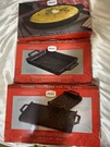 Three (3) Parini Ceramic Cookware For The Grill Set Of 2 Griddles Non Stick. Fixed Price $125.00.