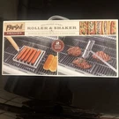 Parini Stainless Steel Hot Dog Roller And Salt & Pepper Shaker - New Box. Fixed Price $14.00.