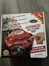 Grillbot Automatic Cleaning Robot Red Bbq Brush Cleaner New Open Box. Fixed Price $69.99.