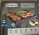 Camp Chef Reversible Grill/griddle 14 X CGG16B New $50. Fixed Price $50.00.