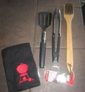 Weber 2-PIECE Premium Tool Set Spatula Tongs W/1 Grill Brushes & Apron. Fixed Price $49.99.