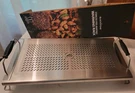 Blackstone Stainless Steel Adjustable Warming Rack. Fixed Price $24.99.