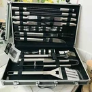 Sharper Image 25 Piece Stainless Steel Grill Set Outdoor Camping Picnic Tool. Fixed Price $105.51.