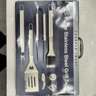 Sharper Image 25 Piece Stainless Steel Grill Set Outdoor Camping Picnic Tool. Fixed Price $23.00.