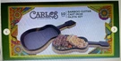 Carlos Santana 10" Cast Iron Fajita Guitar W/ Bamboo Holder. Fixed Price $24.99.