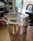Manithra Stainless Steel Stove Top Pressure Cooker With Locking Lid. Fixed Price $32.00.