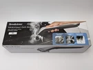 Brookstone Motorized Grill Brush With Steam Cleaning Power New Instructions. Fixed Price $17.95.