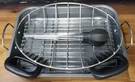 Clavany Roasting Pan With 2 Racks Baster, Cleaning Brush, And Pair Meat Claws. Fixed Price $24.99.